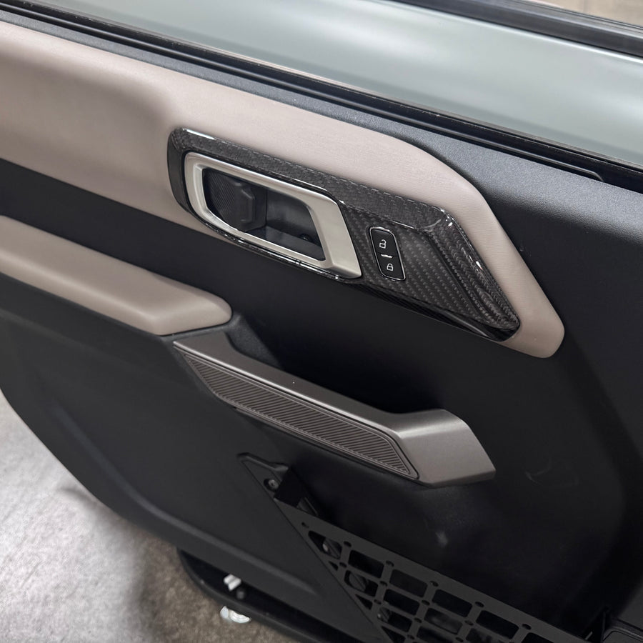 2021+ Ford Bronco Inner Door Handle Cover Overlay (4 Piece Kit) - Real Dry Molded Carbon Fiber